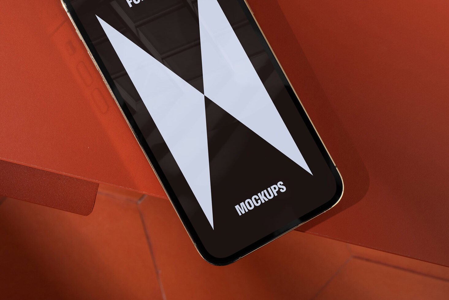 Close-up of a smartphone mockup on a sleek orange background ideal for designers creating realistic mobile app presentations and digital asset previews.