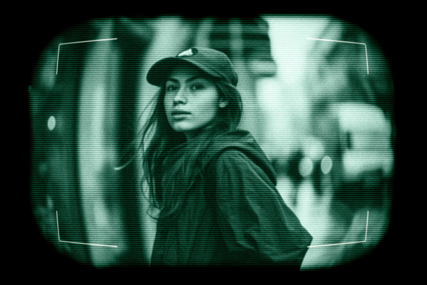 Vintage CCTV mockup featuring a woman in urban setting with cap and hoodie. Ideal for design projects requiring retro surveillance graphics.