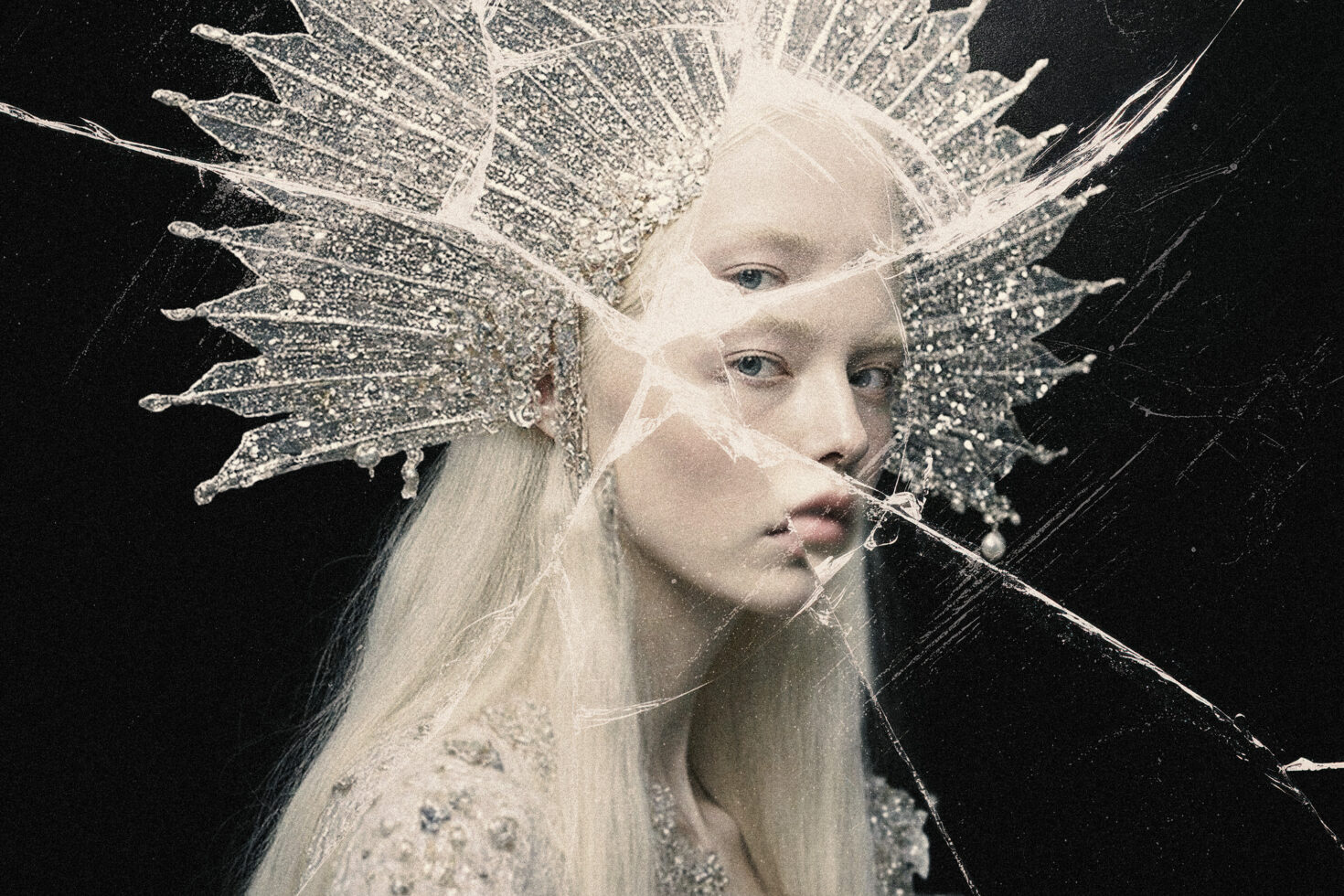 Fantasy portrait of woman with elaborate glittering crown and cracked glass effect overlay, perfect for graphic design projects and creative mockups.