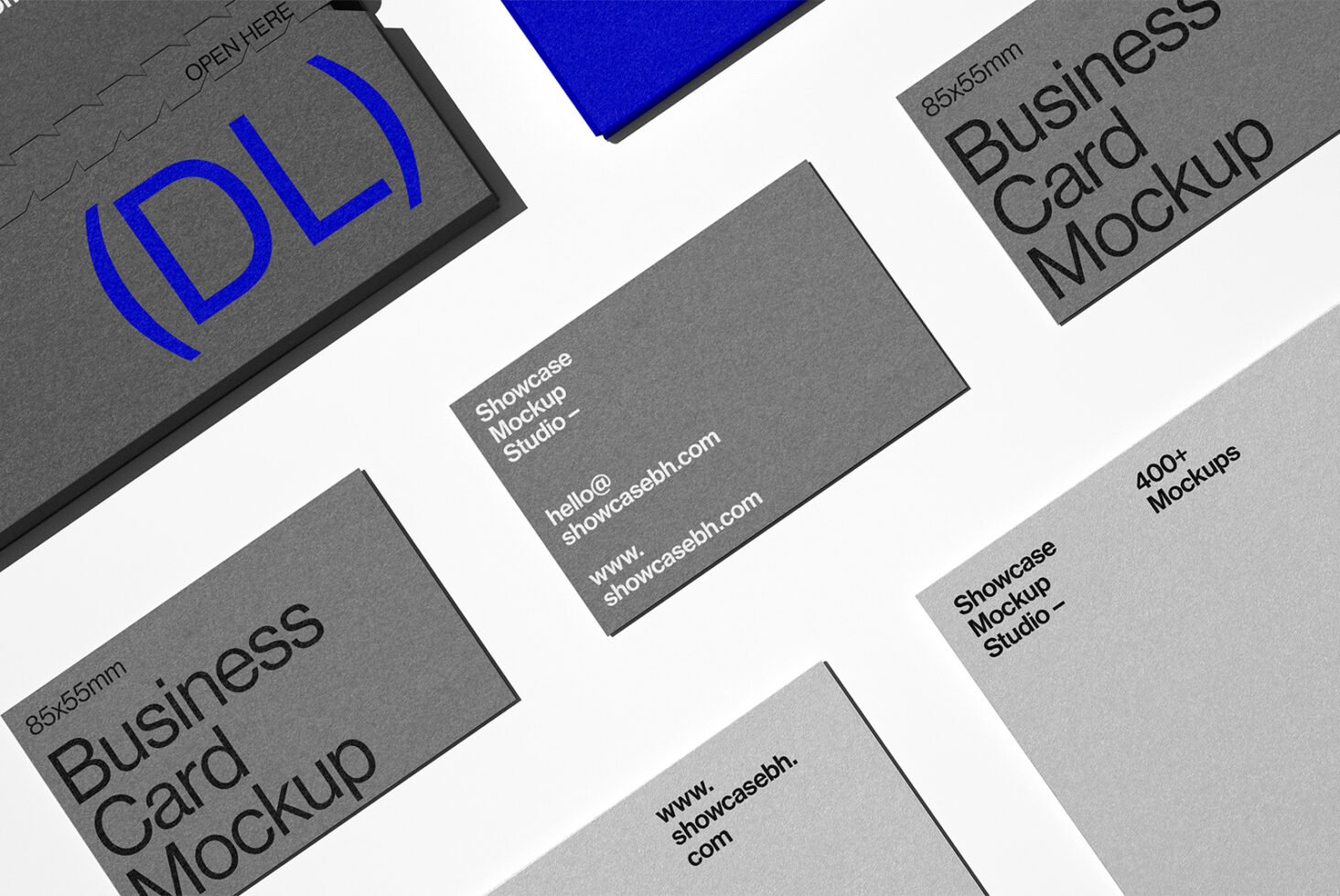 Business card mockup set featuring multiple grey cards on a white background. Ideal for showcasing designs with a professional, modern layout.