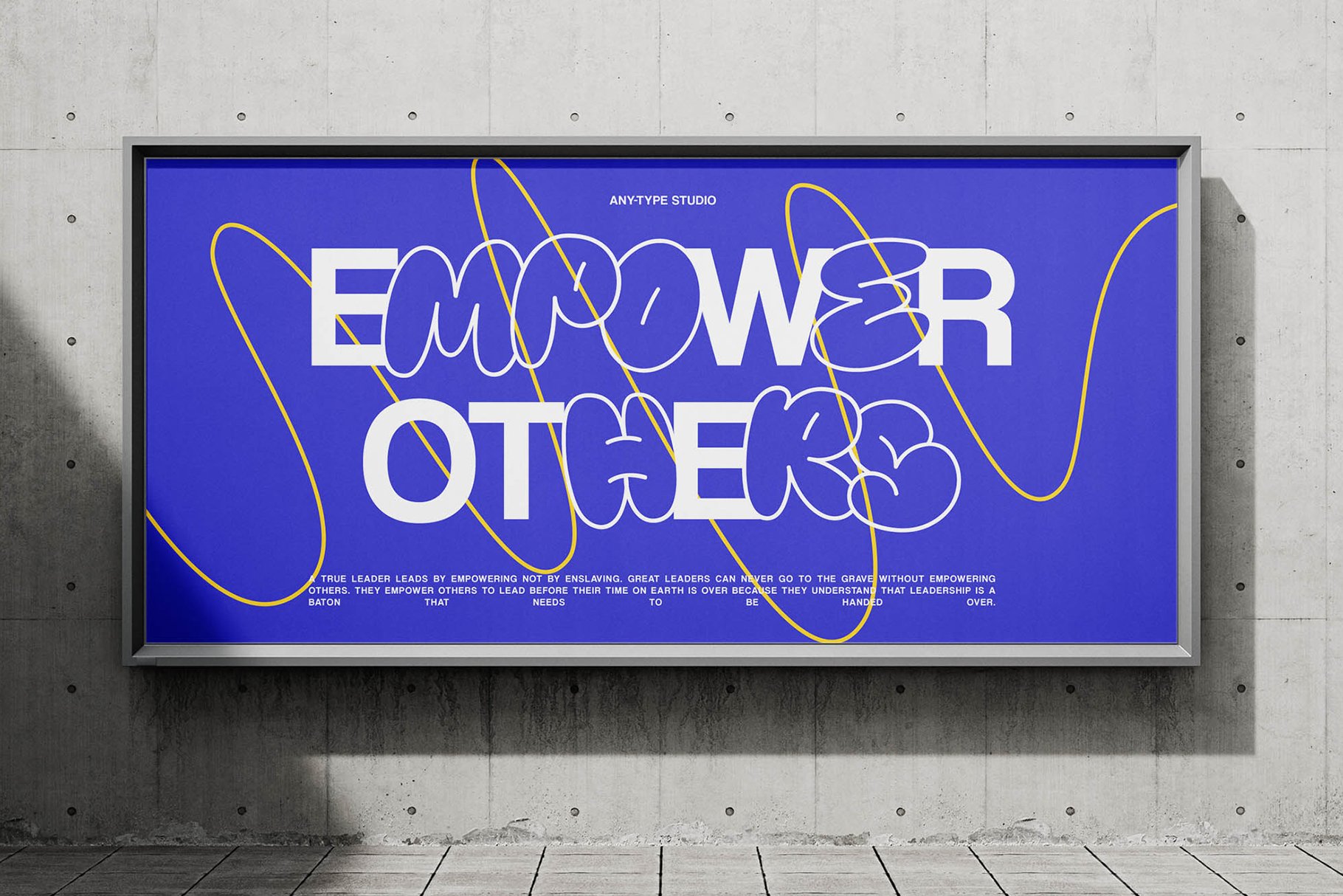 Mockup of a billboard with bold text reading Empower Others on a blue background with yellow abstract lines targets designers seeking inspirational graphics.