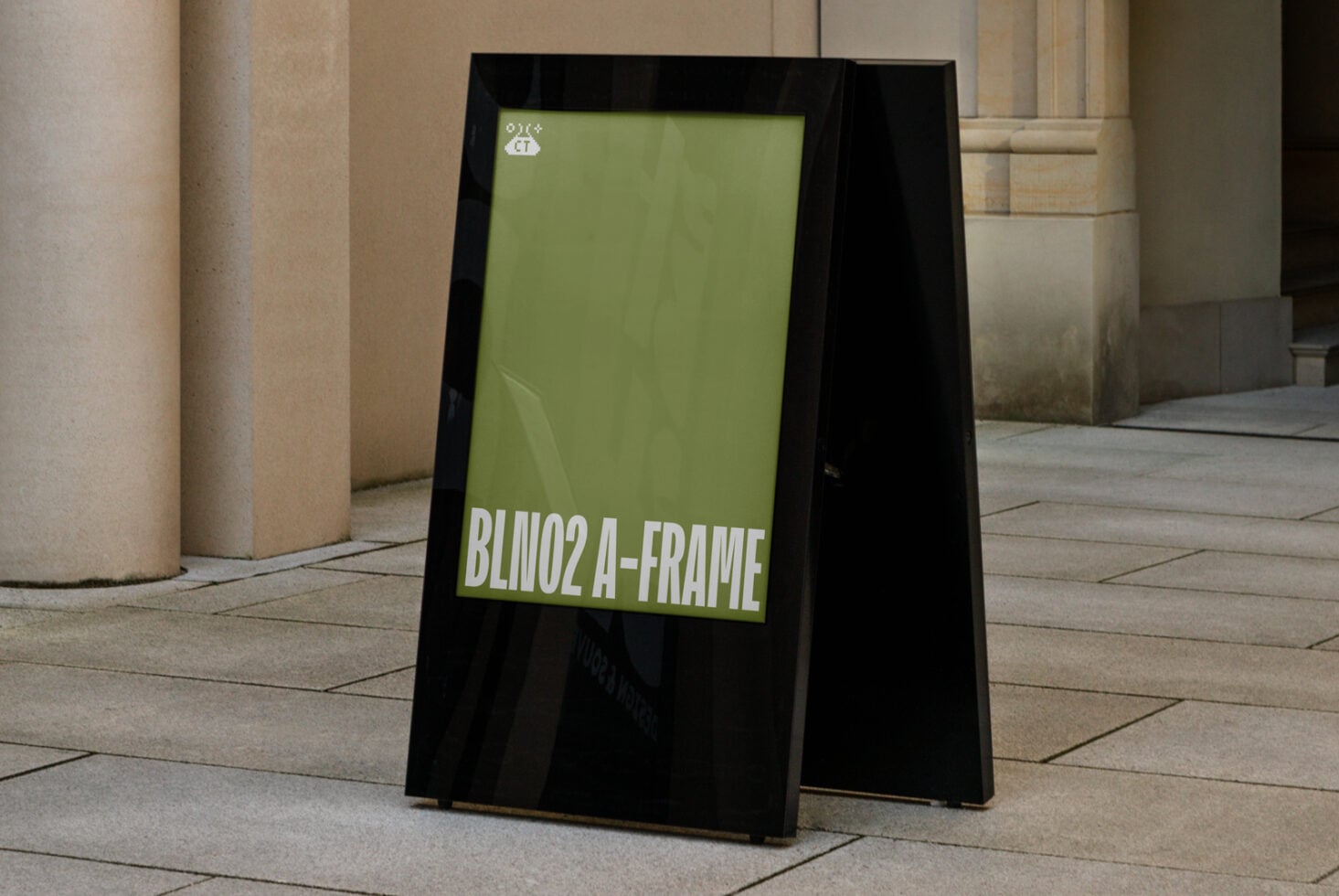 Black folding sandwich board with lime green display panel on stone plaza