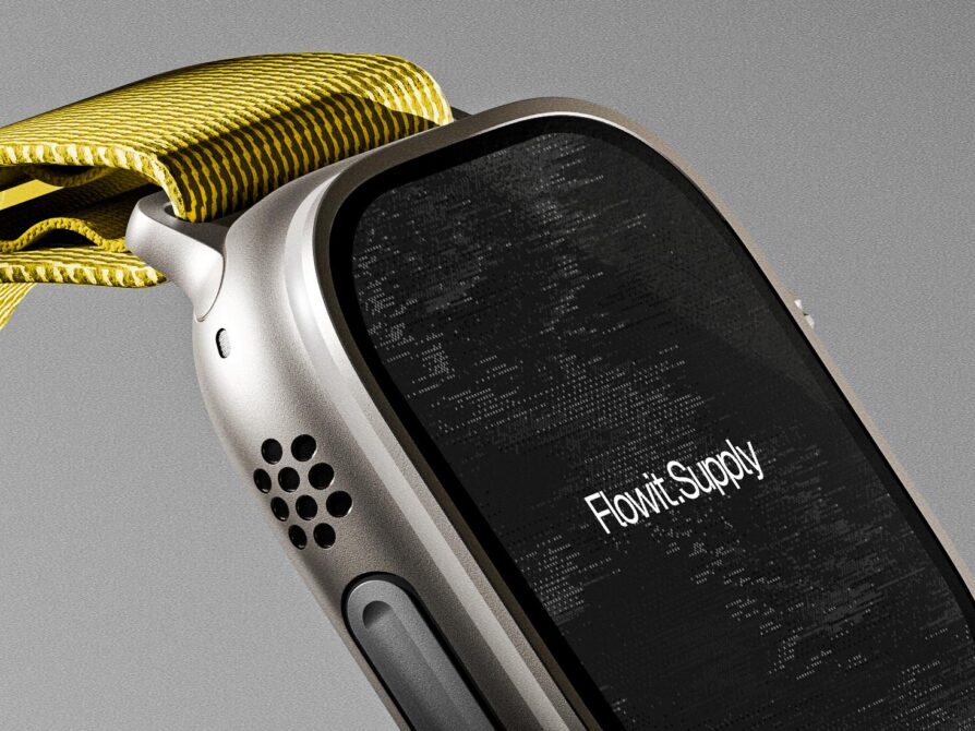 Silver smartwatch with yellow fabric band showing black screen against gray background