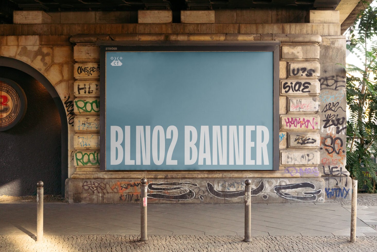 Urban billboard mockup in a graffiti-covered setting showcasing a modern banner template. Ideal for graphic designers seeking realistic advertising visuals.