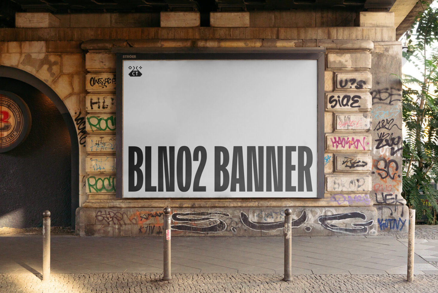 Urban billboard mockup on graffiti-covered wall under a bridge perfect for displaying digital assets for designers template marketing SEO keywords.
