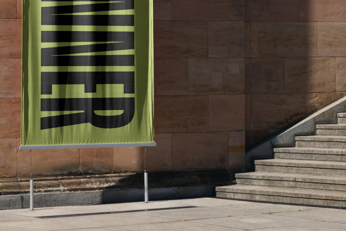 Outdoor vertical banner mockup on a building background perfect for showcasing graphic designs and branding templates for designers and marketers.