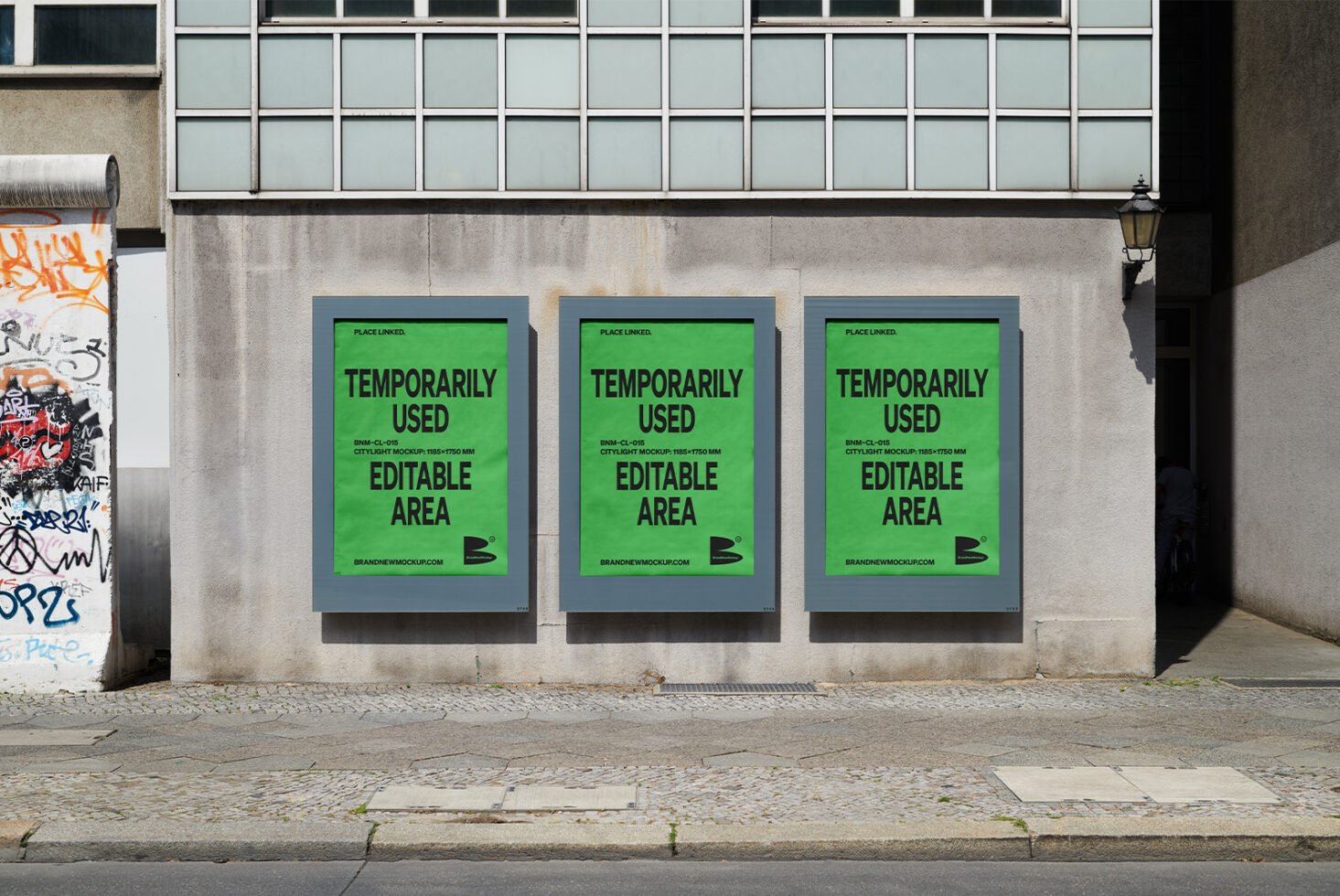 Citylight mockup on urban wall with three green posters reading temporarily used editable area perfect for designers graphics templates mockups SEO