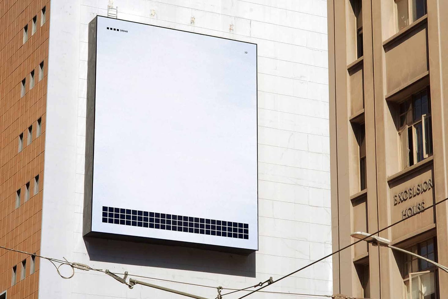 Billboard mockup on urban building with blank white screen surrounded by architecture