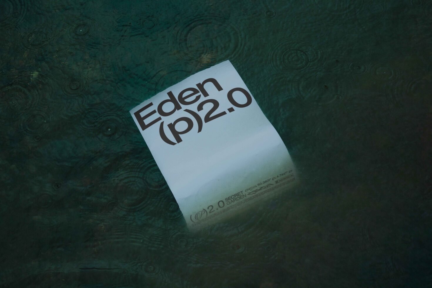 A minimalistic mockup featuring a paper floating on water with bold text Eden p2.0. Ideal for graphic designers seeking modern design inspiration.