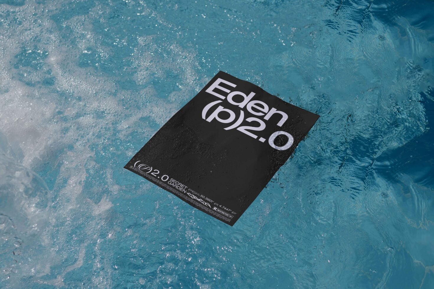 Black postcard tilted on sparkling turquoise water with Eden 2.0 logo