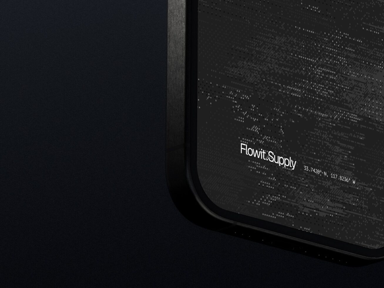 Close-up of a sleek black digital mockup with data points and text Flowit Supply displaying GPS coordinates ideal for tech-themed graphics or designs