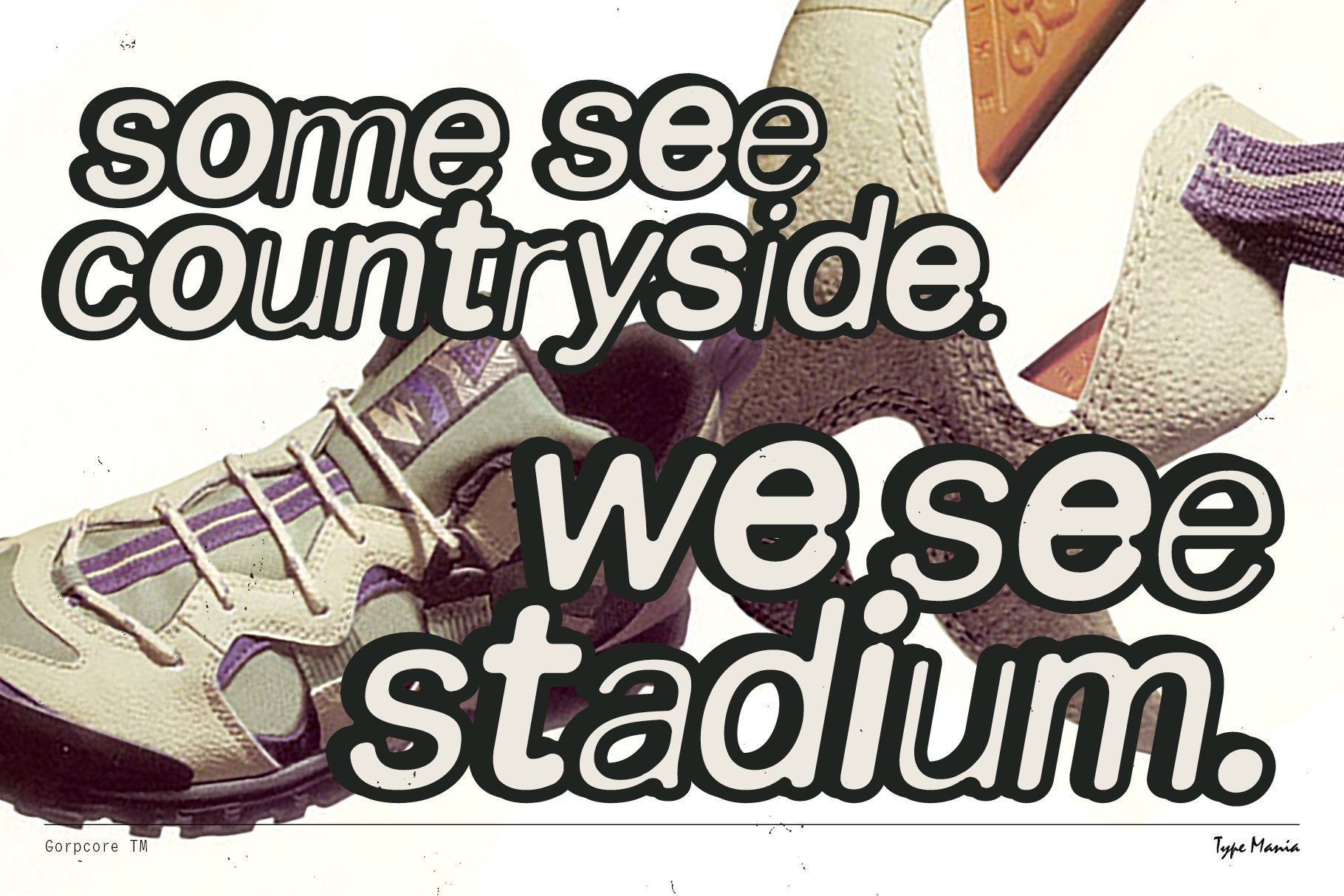Bold typography overlaid on hiking shoes stating some see countryside we see stadium keywords: typography, bold font, footwear, design asset, designer resource.
