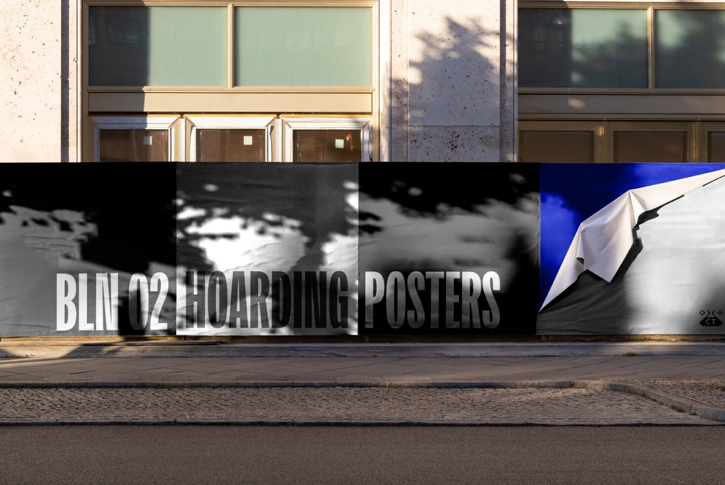 Hoarding mockup with shadow overlay, text reads BLINO2 HOARDING POSTERS, fabric corner detail