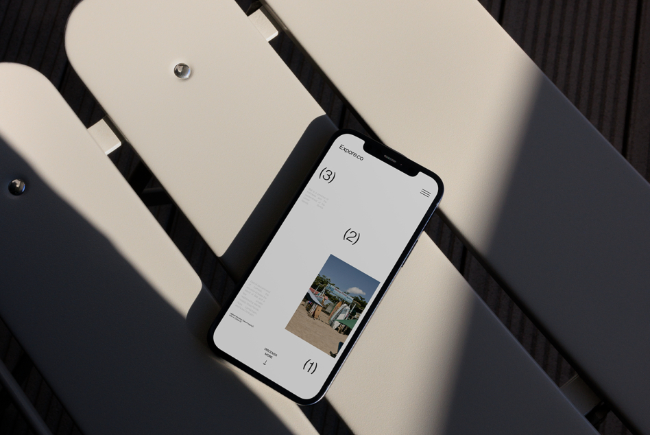 iPhone displaying Espaces portfolio website with numbered sections on layout