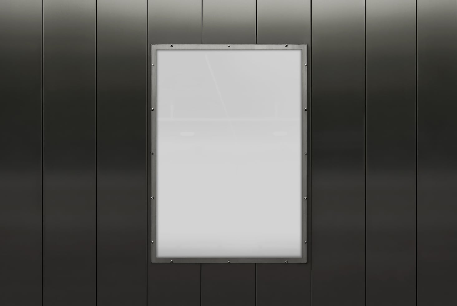 Metallic wall with a blank vertical poster frame mockup, ideal for presenting graphic designs, advertisements, brand templates; sleek industrial look.
