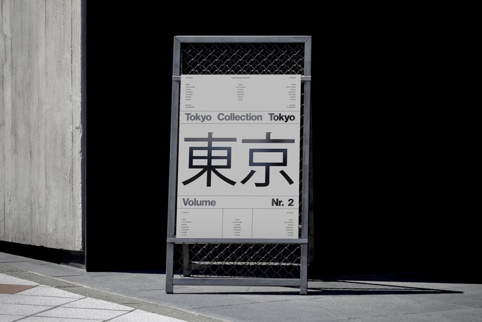 Street poster mockup with Tokyo kanji characters on mesh barrier