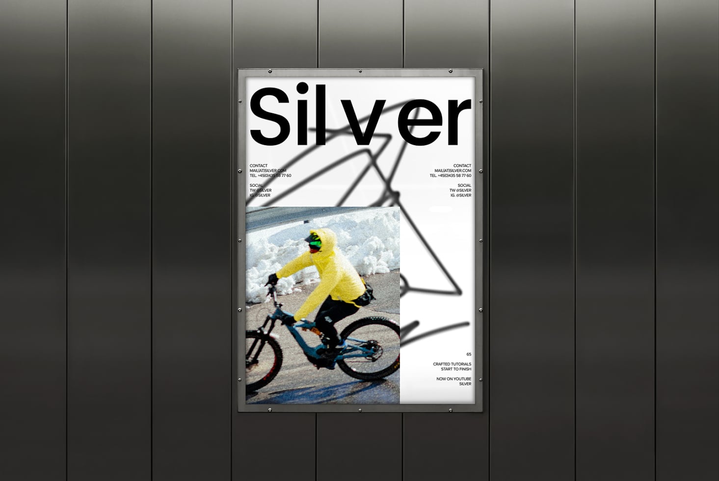 Modern magazine mockup on metallic wall featuring bold text Silver and a cyclist. Ideal graphic design asset for showcasing branding or editorial layouts.