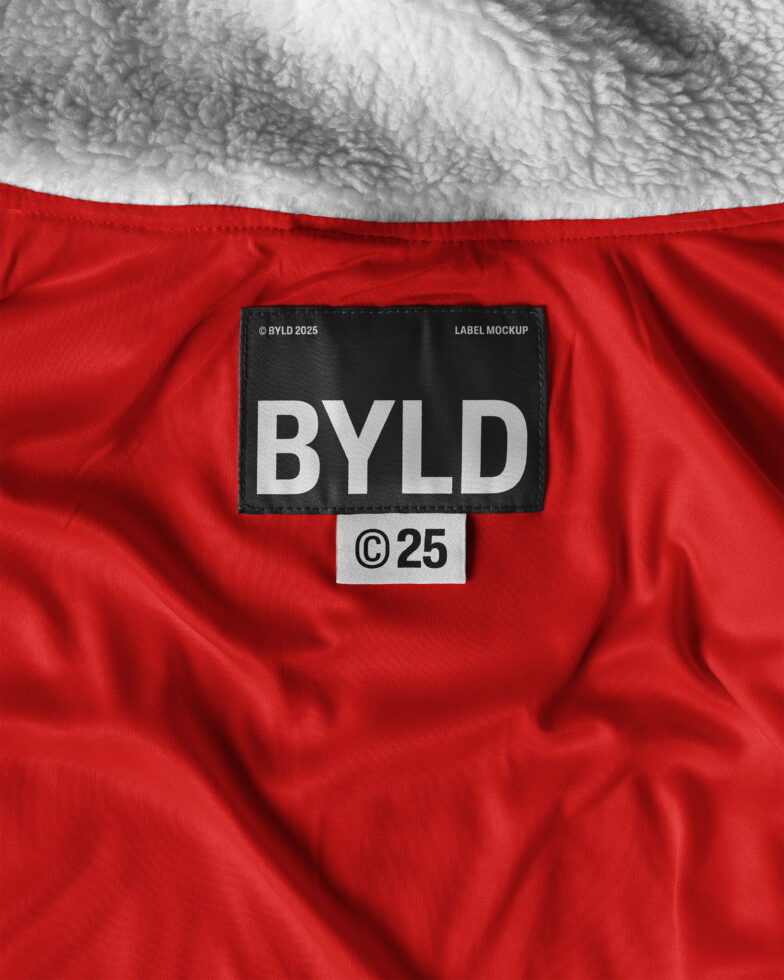 Fabric label mockup on red and gray textured textile suitable for apparel and fashion designers emphasizing branding and label design resources.