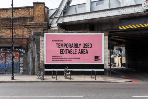 Urban billboard mockup displaying a pink temporary sign. Perfect for graphic design presentations and advertising templates. Editable area available.