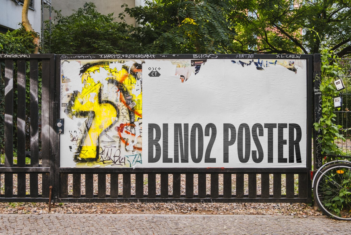 White billboard with yellow graffiti art on left, dark gray text reads BLINO2 POSTER