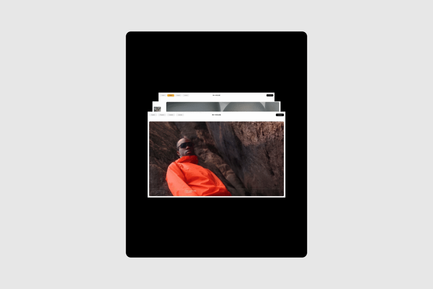Web browser mockup featuring a person in an orange jacket against rock background ideal for designers seeking realistic presentation templates.