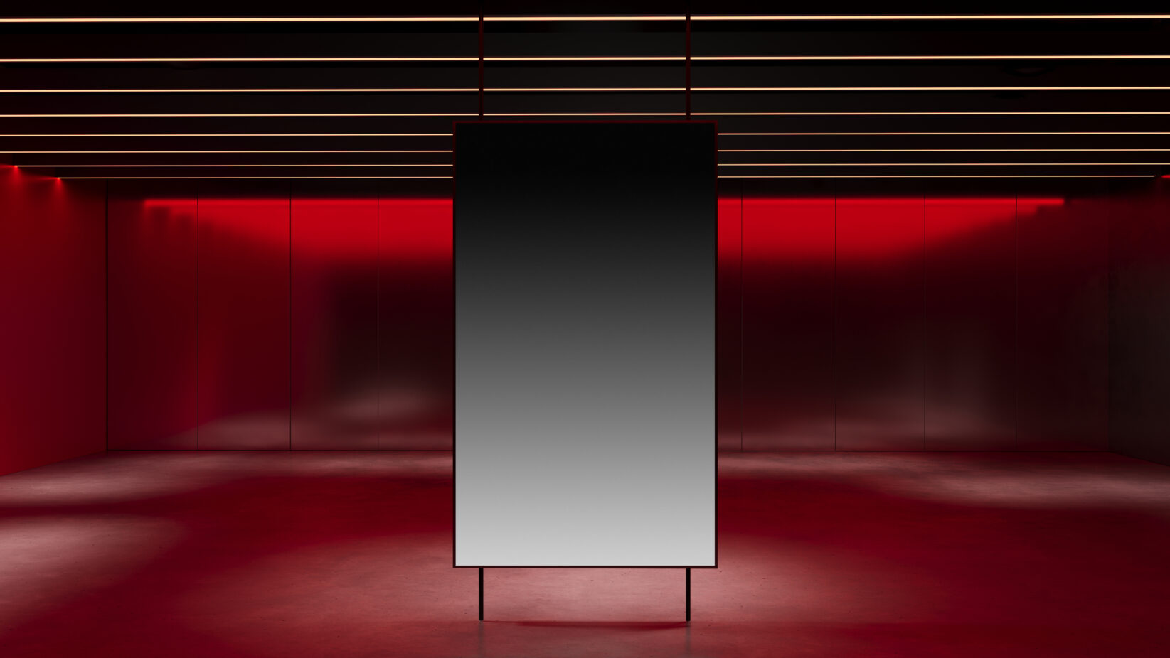 Modern design mockup showcasing a sleek vertical rectangular screen in a red-lit minimalist interior setting ideal for designers seeking unique visuals.