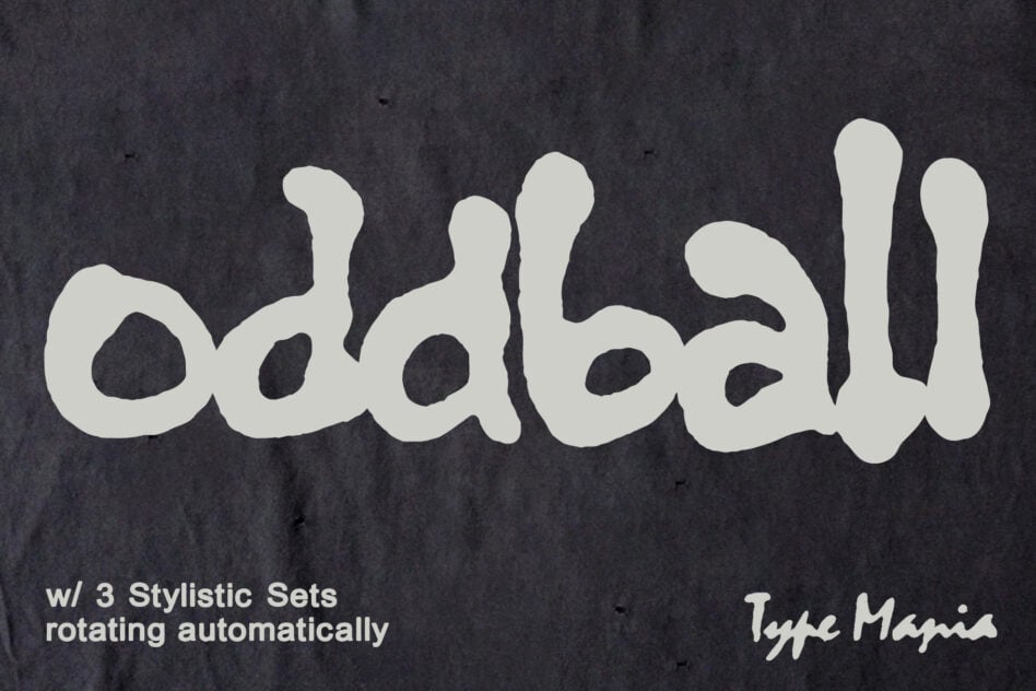Cream wavy letters spelling Oddball on textured dark surface with rotating sets note