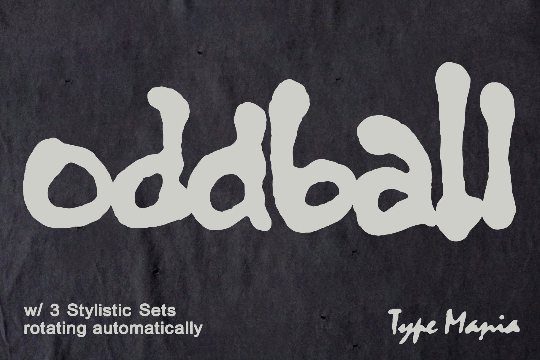 Cream wavy letters spelling Oddball on textured dark surface with rotating sets note