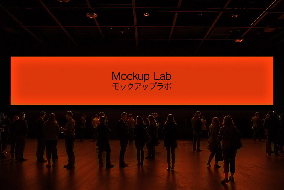Large orange display reading Mockup Lab with silhouettes of people in a dark room SEO keywords mockup crowd design conference event branding