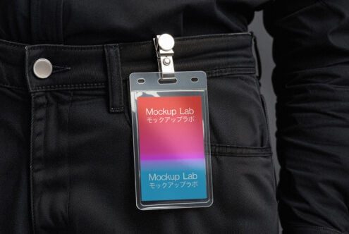 ID badge mockup clipped to black pants featuring bold text and gradient background perfect for designers seeking professional branding templates.