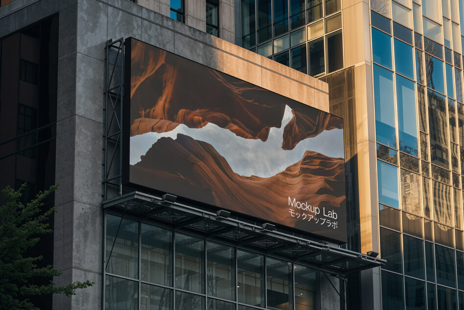 Desert landscape photograph displayed on outdoor billboard in urban setting