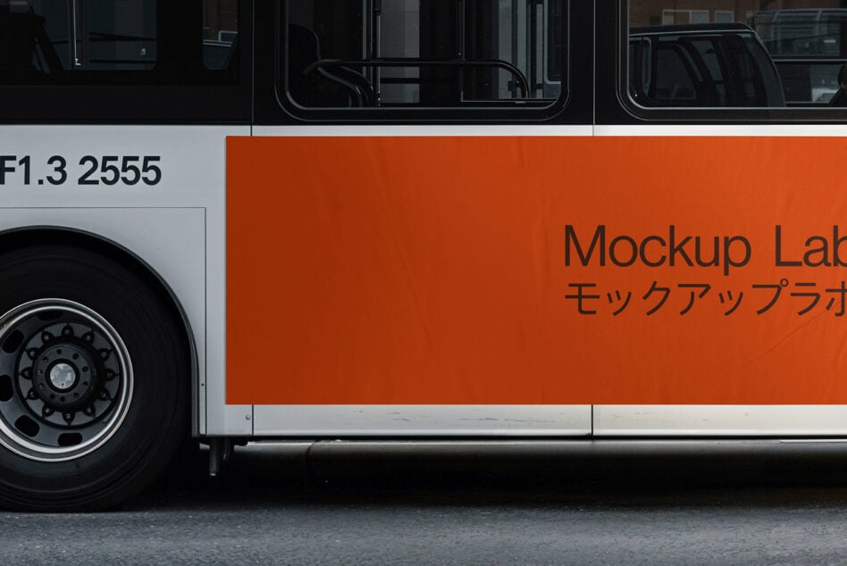 Bus advertisement mockup with orange background and text. Ideal for showcasing branding designs. High-quality template for graphic designers.