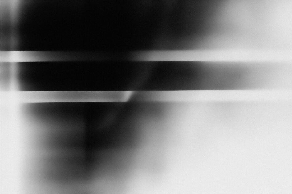 Blurred horizontal scan lines dark light grain texture overlay abstract glitch effect