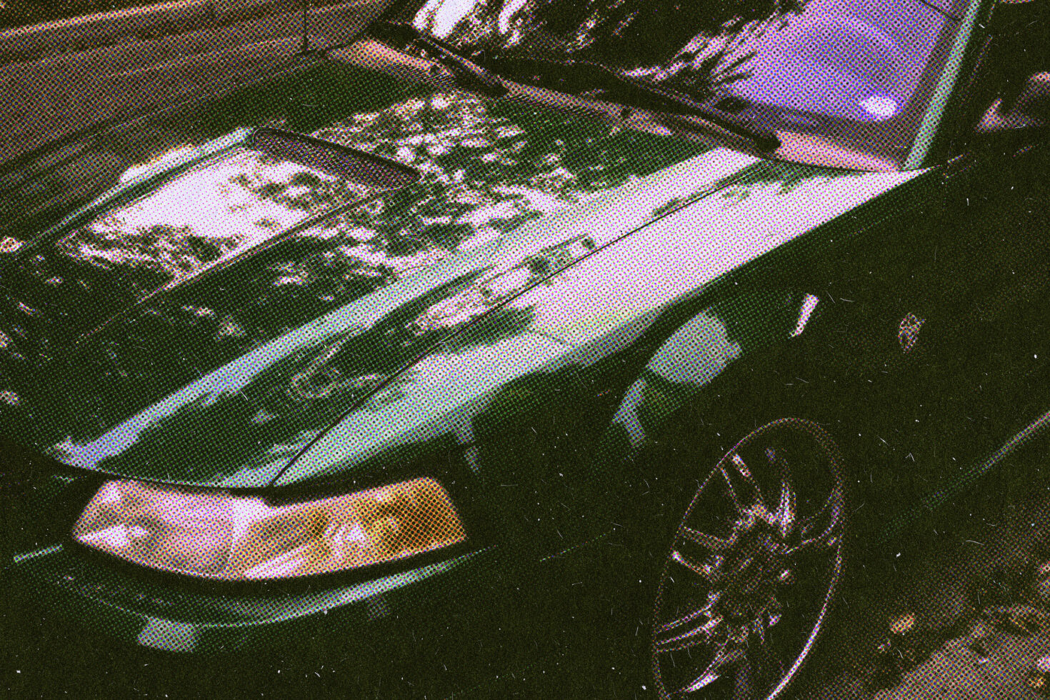 Vintage halftone photo effect of a green car with reflections on the hood perfect for graphic design mockups retro themes and creative templates