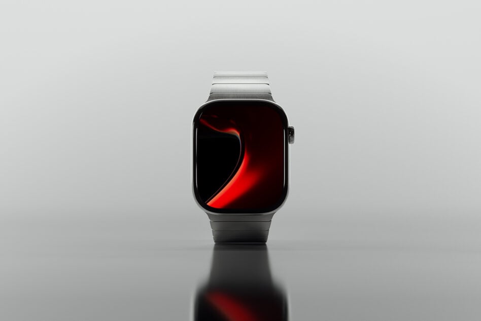 Silver smartwatch showing red flowing abstract wallpaper on screen