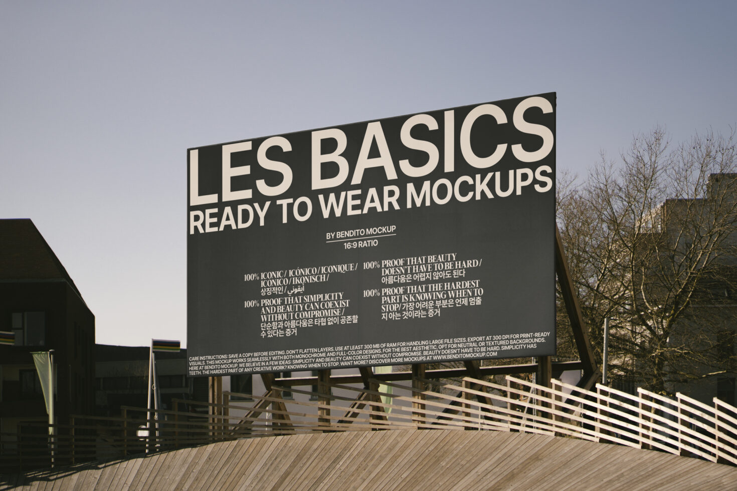 Billboard showcasing Les Basics ready-to-wear mockups for design projects. Urban setting, clear sky. Keywords: mockups, design, billboard, urban.