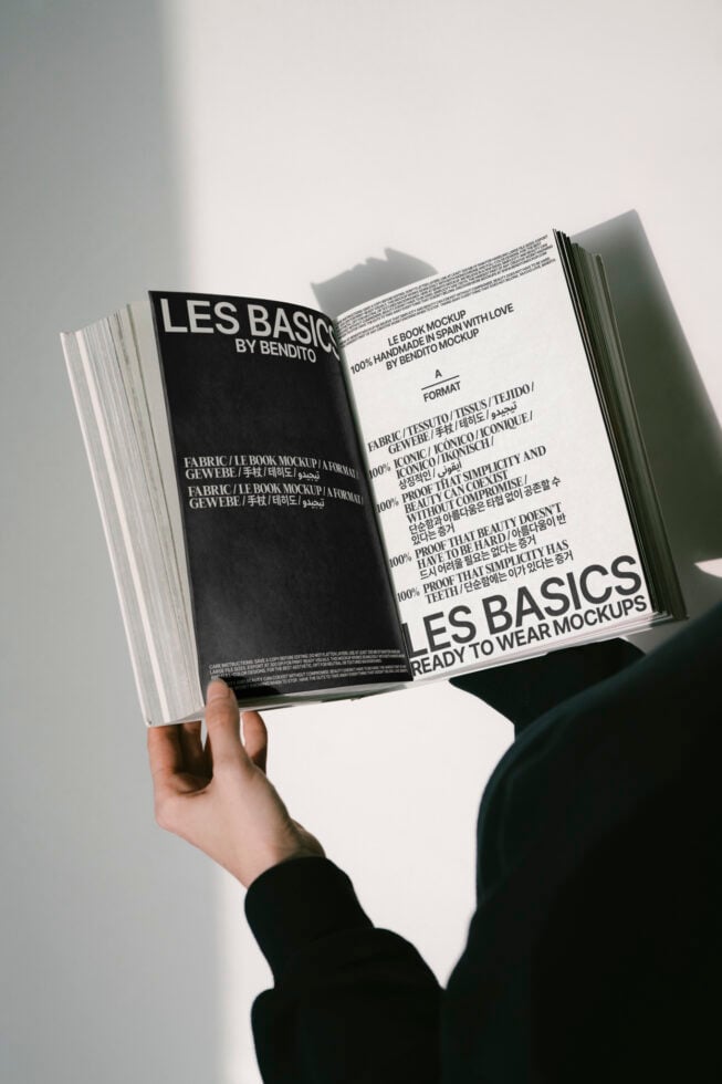Open book mockup with black and white pages featuring design and typography. Ideal for showcasing editorial layouts or font presentations.
