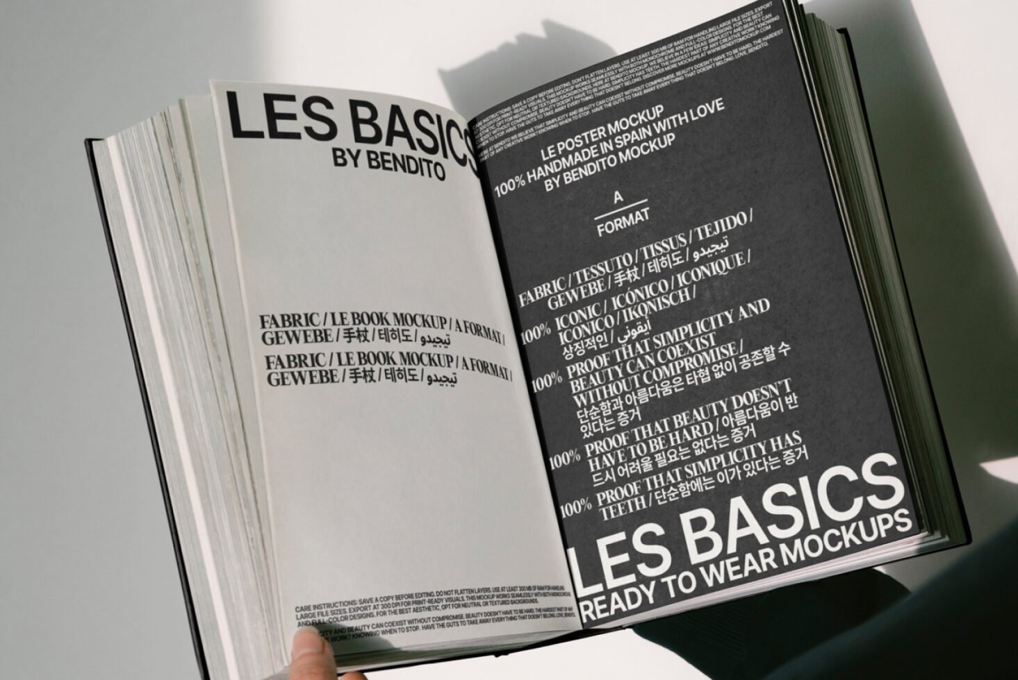 Open book showcasing a dynamic mockup for designers. Includes bold typography and multilingual text, perfect for design presentations, templates, and graphics.