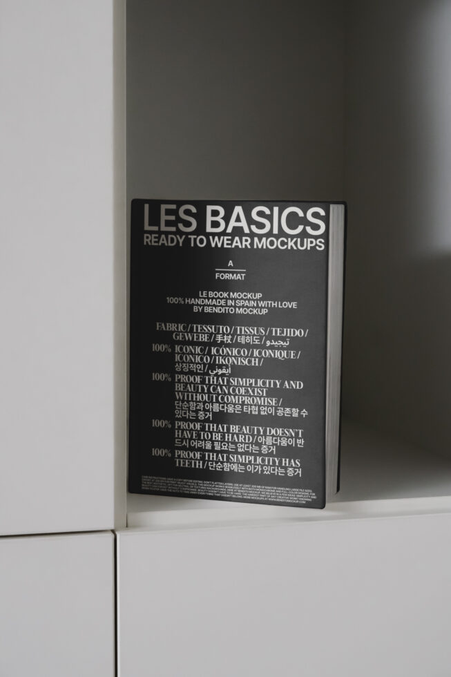 Book mockup titled Les Basics on a shelf featuring minimalist design ready-to-wear mockups ideal for graphic designers and template creators.