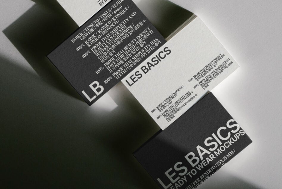Close-up of folded clothing tags showing Les Basics care instructions in multiple languages