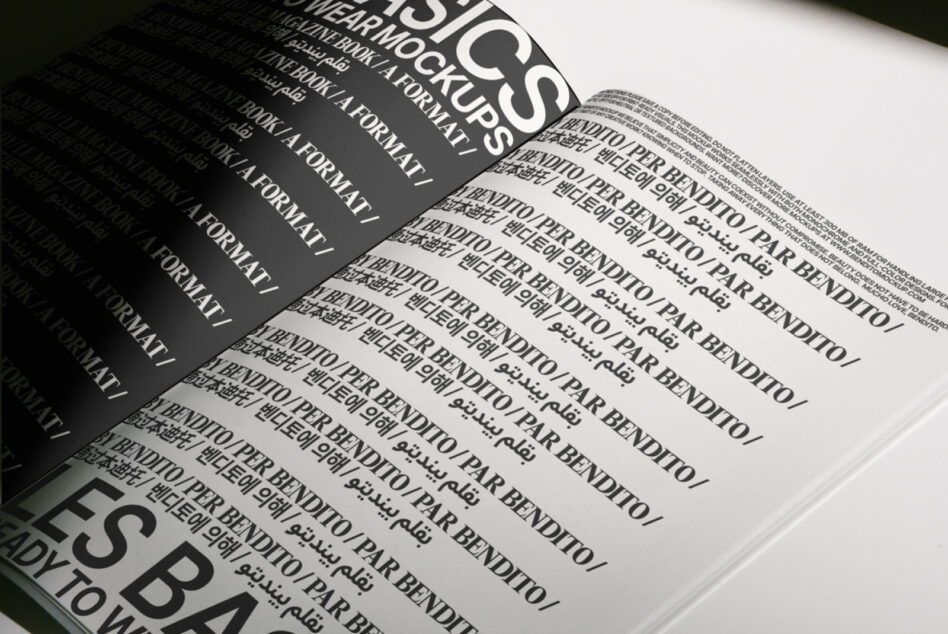 Magazine opened showing left dark page right white page closeup