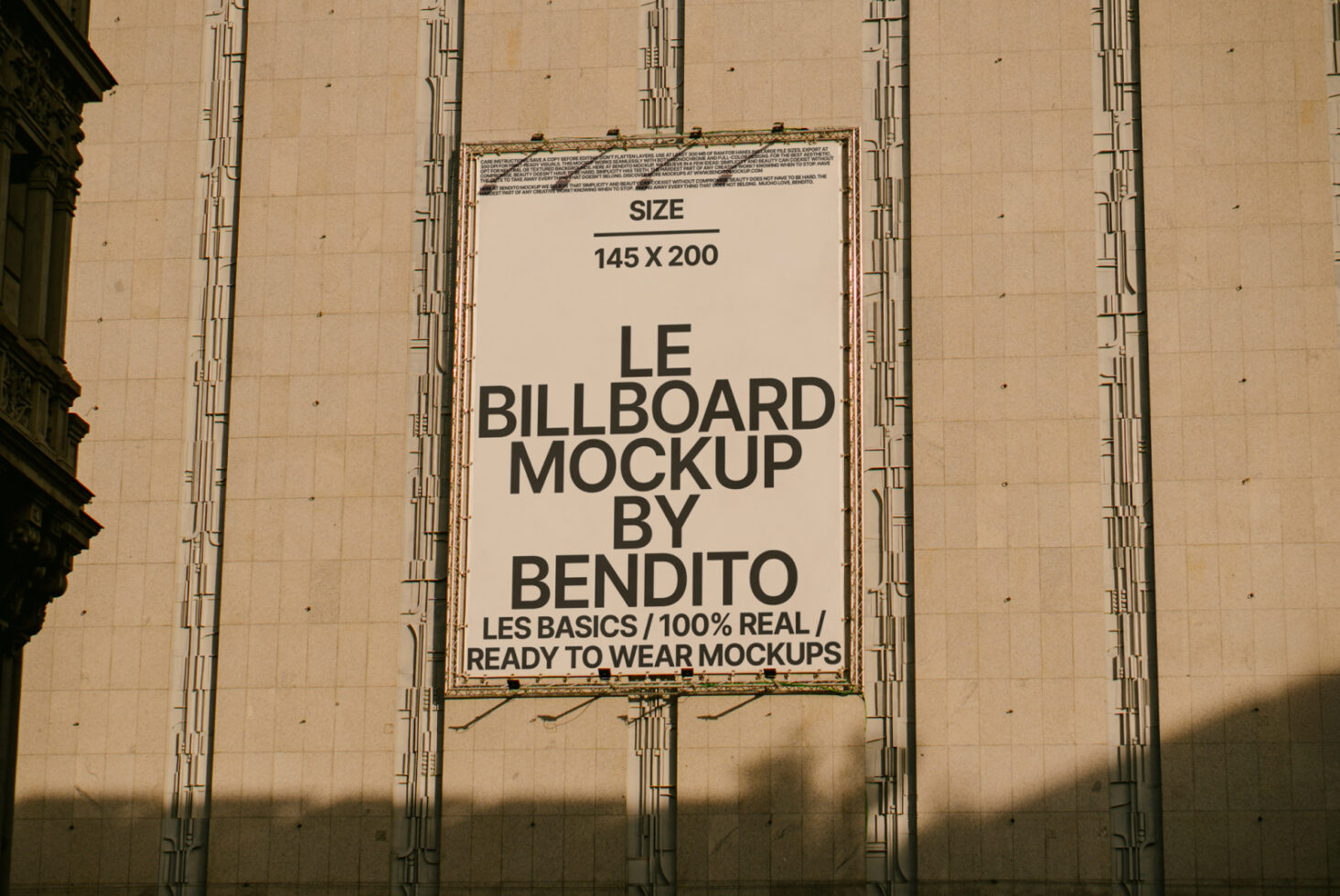 Cream banner on concrete wall showing Le Billboard Mockup 145x200 by Bendito