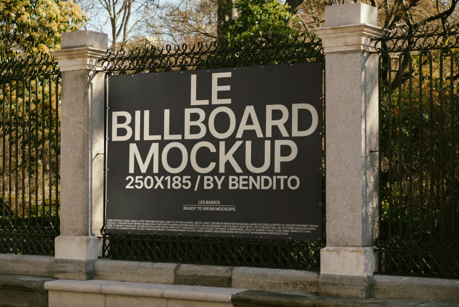 Black billboard mockup on decorative gate with Le Billboard text visible