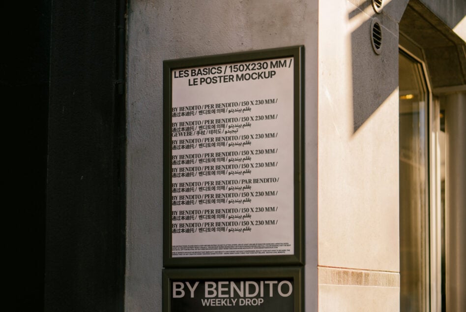 Framed poster mockup in hallway with dark green frame on concrete wall