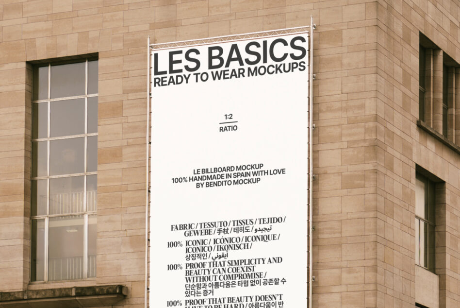 Les Basics Ready to Wear Mockups tall billboard mounted on corner building white space
