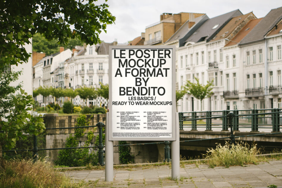 White outdoor poster mockup on stand overlooking European riverside with trees