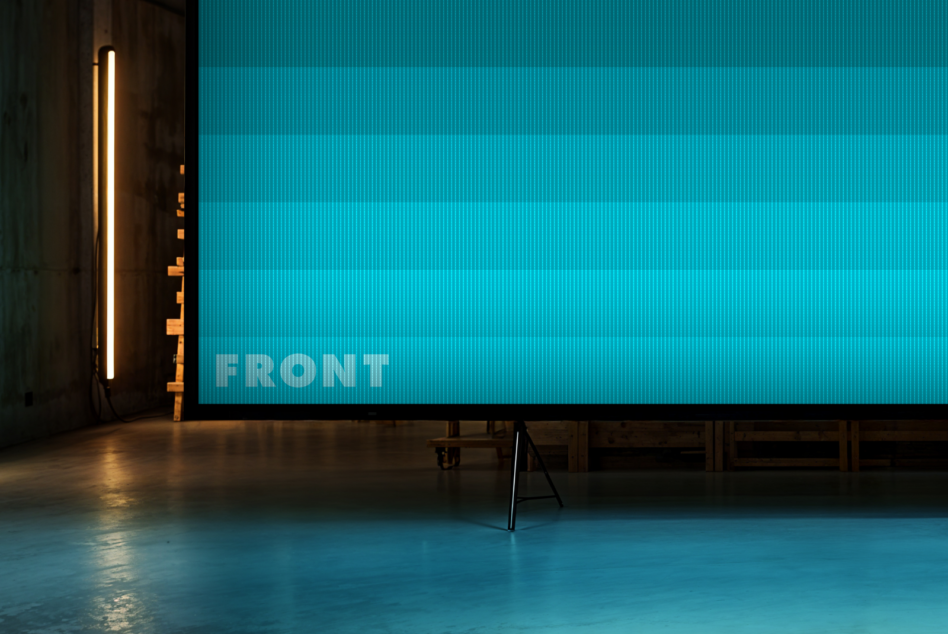 Large display screen mockup in industrial setting with vertical stripes and text Front suitable for design presentations templates and graphics showcases.
