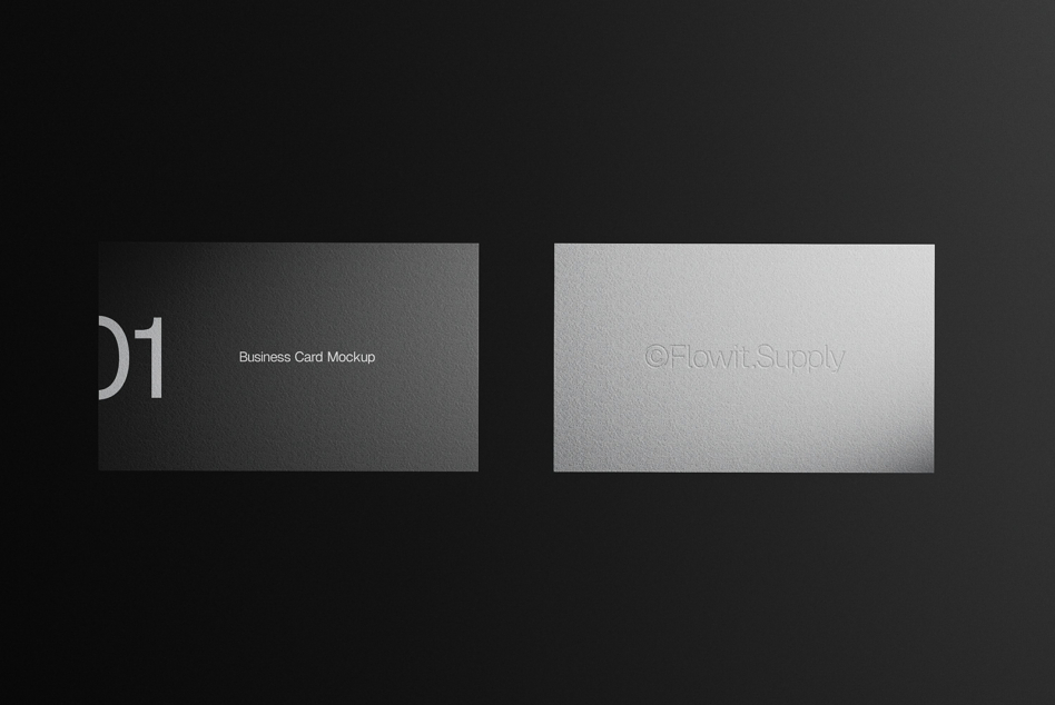 Two business cards displayed side by side, dark gray on left, light gray on right
