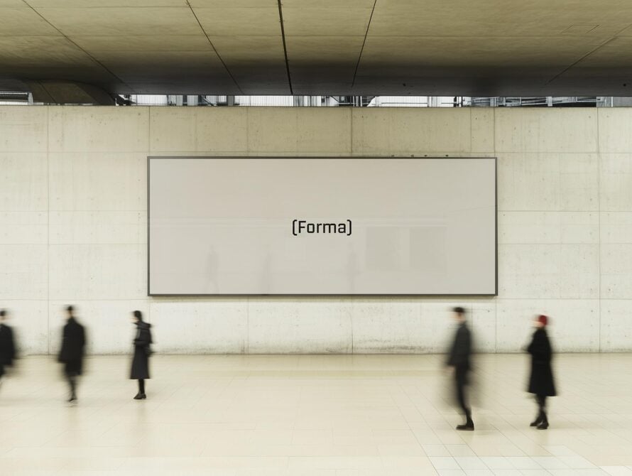 Concrete wall with large rectangular poster mockup in an urban setting. Blurred pedestrians walk by. Suitable for showcasing graphic designs.