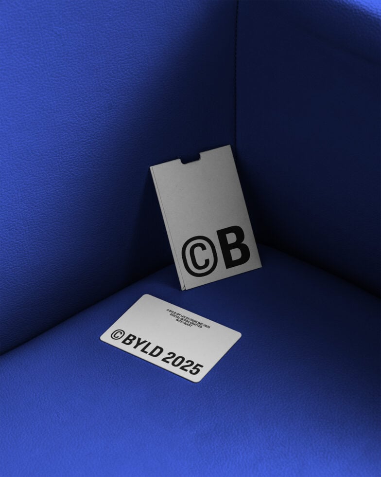 Business card mockup next to blue cigarette pack in corner product display